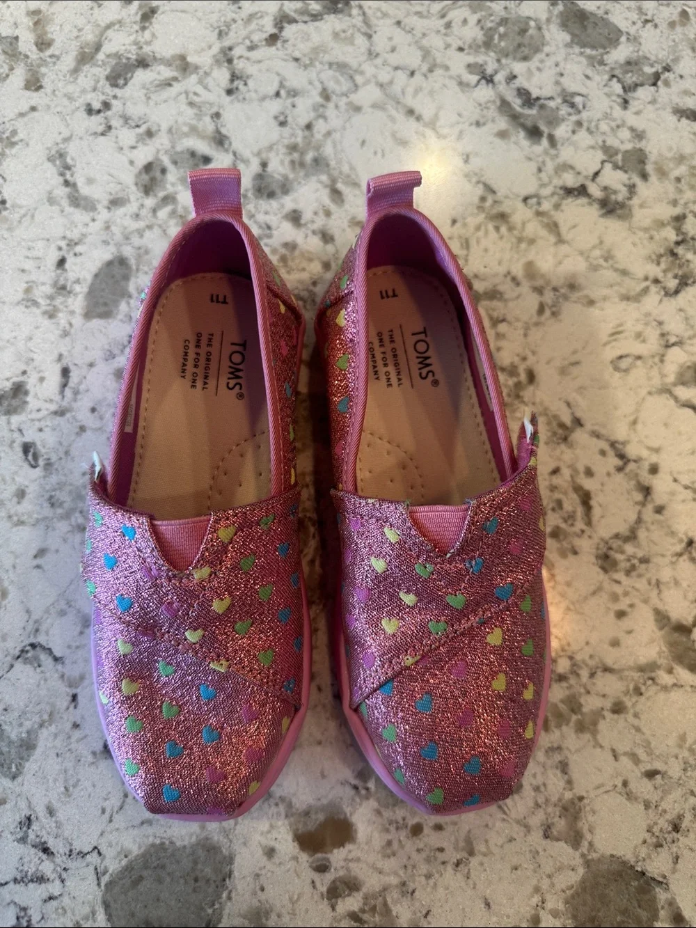 NWOT-TOMS Pink Glitter Heart Print Slip-On Sneakers. Size 11